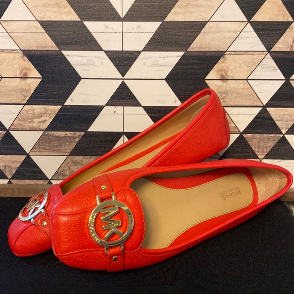 New.  Scuffing from being tried on